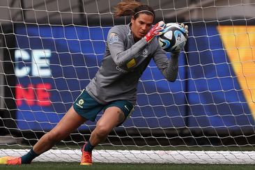 Matildas goalkeeper Lydia Williams dives for the ball during a training session.