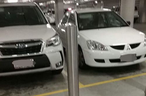 The elderly lady's car pictured on the right and the car she hit.