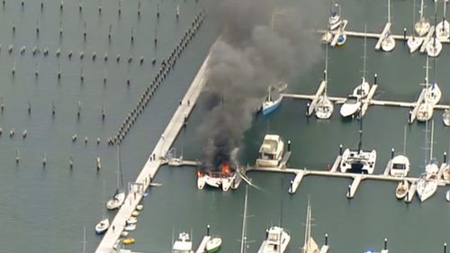 Smoke and flame poured into the air. (9NEWS)