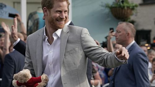 The prince looked relaxed as he greeted hundreds of crowd members. (Getty)