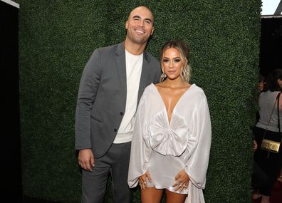 Mike Caussin and Jana Kramer arrive to the 2019 E! People's Choice Awards held at the Barker Hangar on November 10, 2019. 