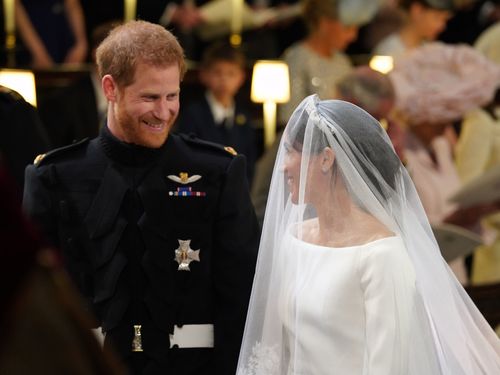 Harry and Meghan sharing a loving look during the ceremony. (AAP)