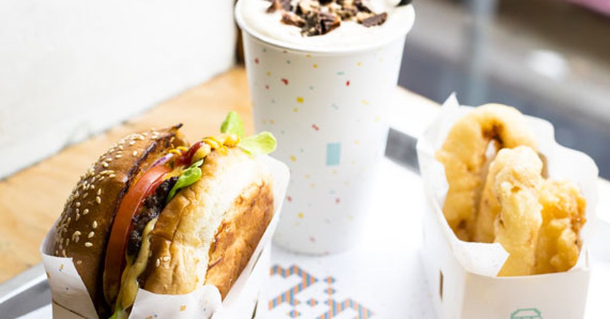 8Bit's burger with cheese, beer battered onion rings and peanut butter milkshake - 9Kitchen