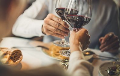 Couple drinking wine on date