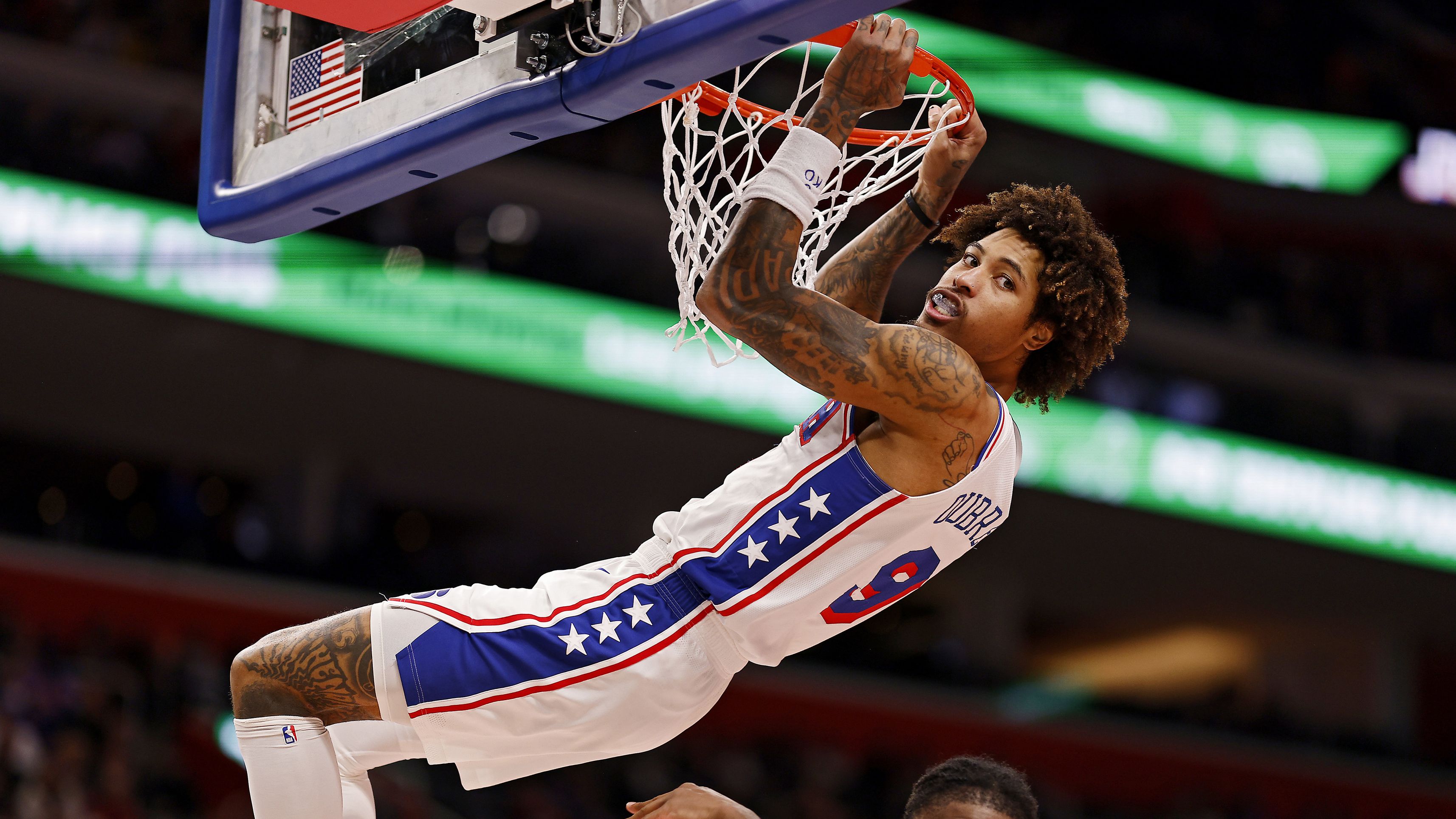 Kelly Oubre dunks the ball during the Philadelphia 76ers&#x27; game against the Detroit Pistons.