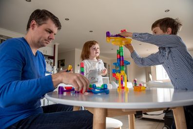 Husband Simon with their children Nick, five, and Emma, two.