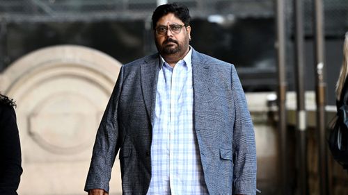 NAB scam fraud trial $21 million - Srinivas Chamakuri arrives at the Downing Centre District Court in Sydney.