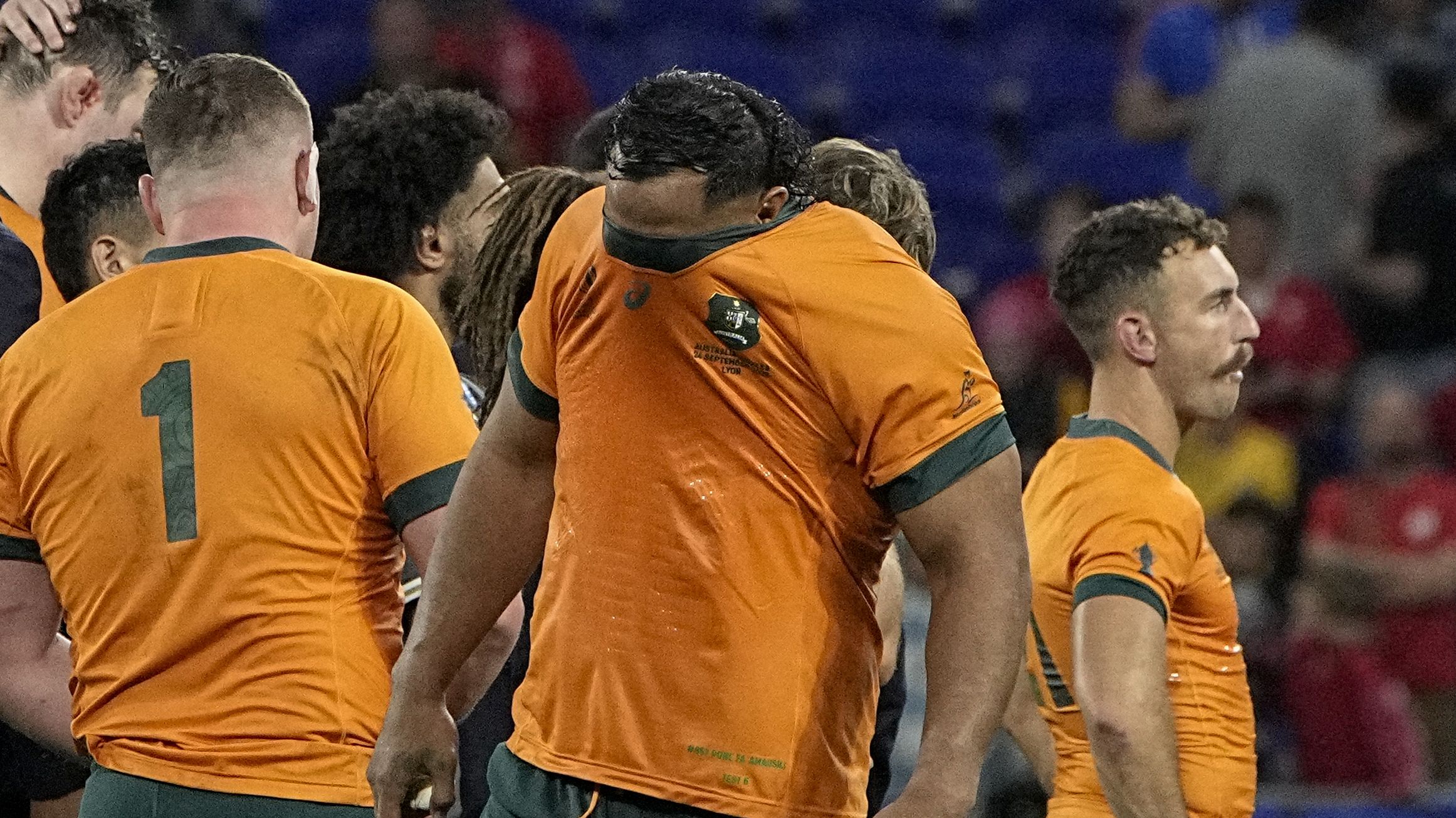 All-time low. Australia&#x27;s Pone Fa&#x27;Amausili covers his face after his side&#x27;s 6-40 lost against Wales.