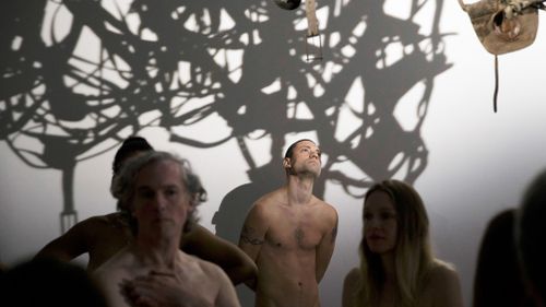 The Palais du Tokyo museum opened its doors to an estimated 160 nudists for a "special visit Saturday". (AP)