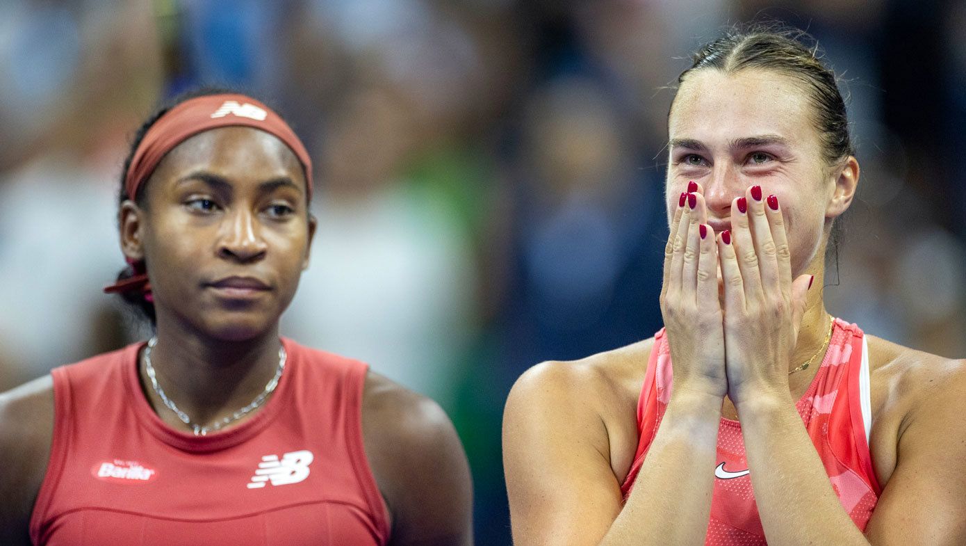 Coco Gauff and Aryna Sabalenka react during the trophy presentation after Gauff&#x27;s win in the 2023 US Open women&#x27;s singles final.