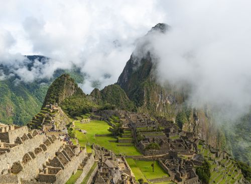 Machu Picchu in the clouds, Machu Picchu Historical Shrine, Cusco, Peru.