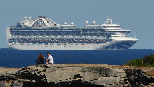 The Ruby Princess sits off the coast of Sydney, on April 5. At least 13 passengers from the Ruby Princess have died due to the coronavirus and a number of crew have been taken off the ship and hospitalised. 