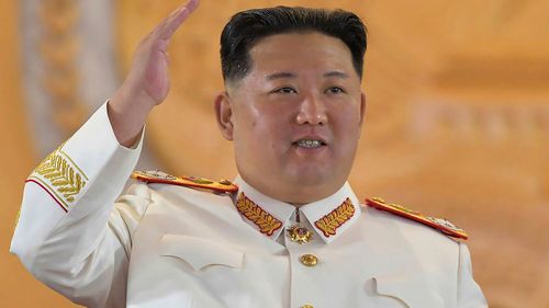 North Korean leader Kim Jong Un watches a military parade