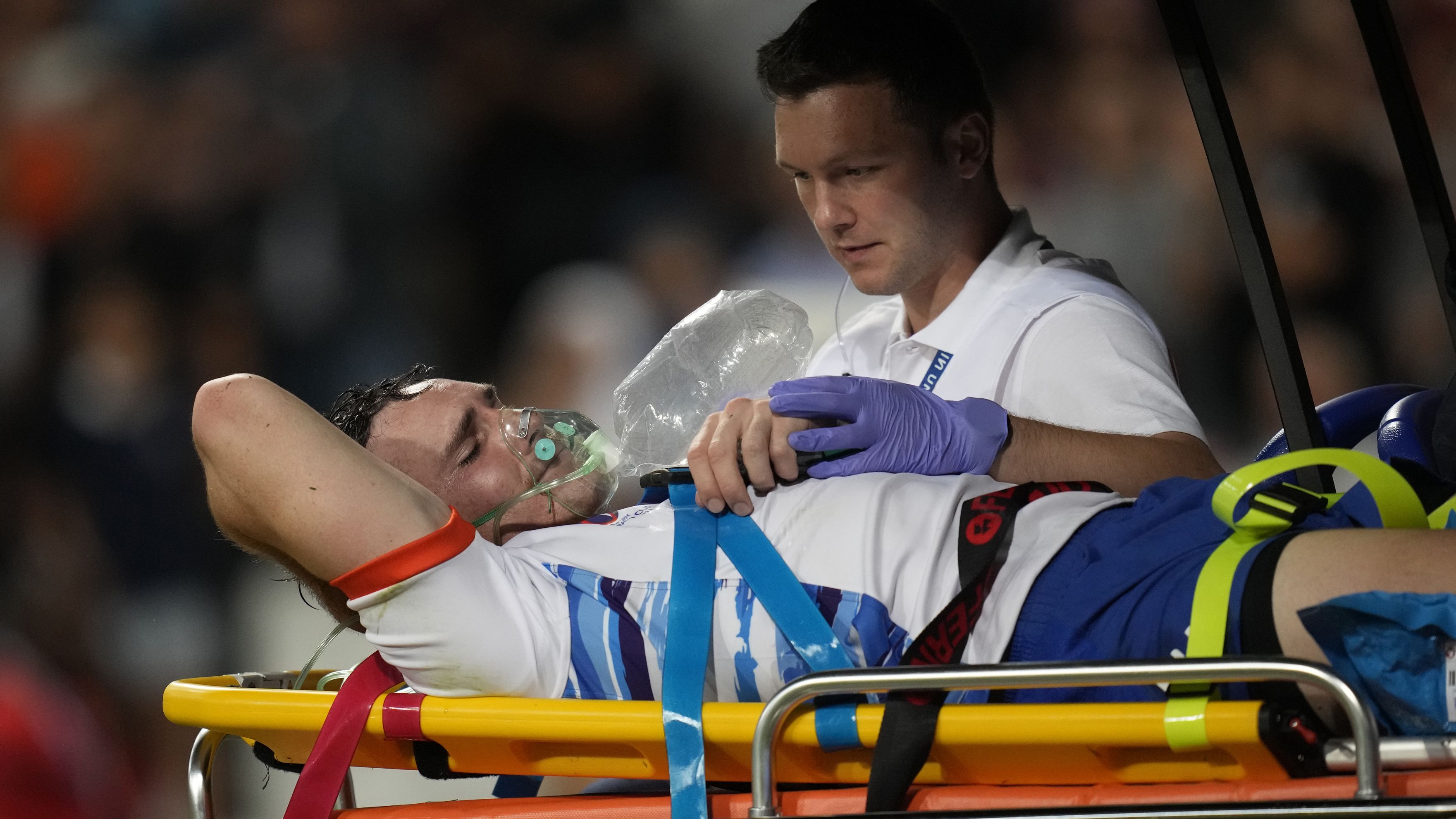Namibia&#x27;s Le Roux Malan is taken off the field on a stretcher after breaking and dislocating his ankle.