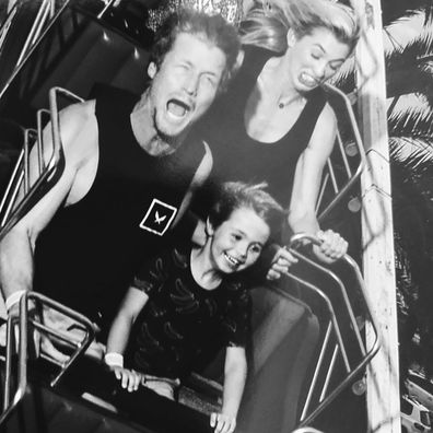 Richie Strahan, Elijah and Alex Nation on a rollercoaster in Melbourne.