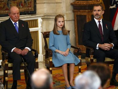 Former King Juan Carlos, left, Princess Leonor and King Felipe sit during a ceremony in 2018. 