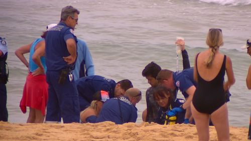 The man went into cardiac arrest as he was pulled from the water. (9NEWS)