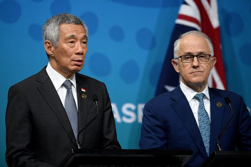 The Prime Minister and Singapore's PM Lee Hsien Loong speak to the media as the ASEAN Summit closed. (AAP)
