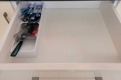 Cutlery and utensil drawer organised with Kmart slimline cutlery holder