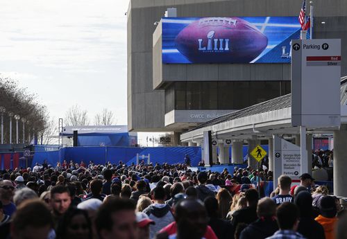 Fans walk into the NFL experience in Atlanta, Georgia.