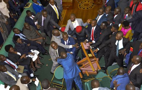 Politicians could be seen being hit with chairs during the brawl. 