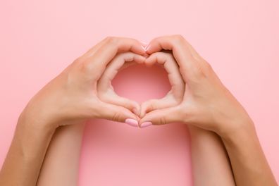 Hands in a heart shape. Love heart. Mother and daughter. Mother's love.