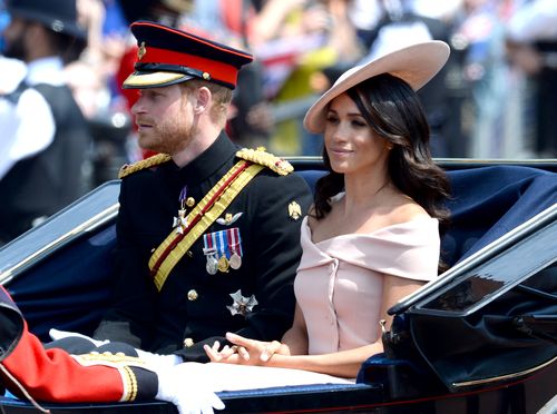 The Duke and Duchess of Sussex during the carriage procession along The Mall at Trooping The Colour. Picture: AAP