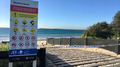 The man's body was found in surf on Stockton Beach.