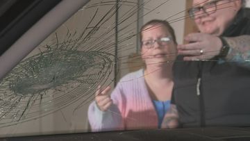 Rock thrown from bridge onto car windscreen