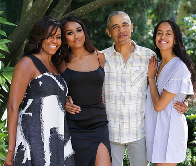 Michelle and Barack Obama with daughters Sasha, 18, (left) and Malia, 21.