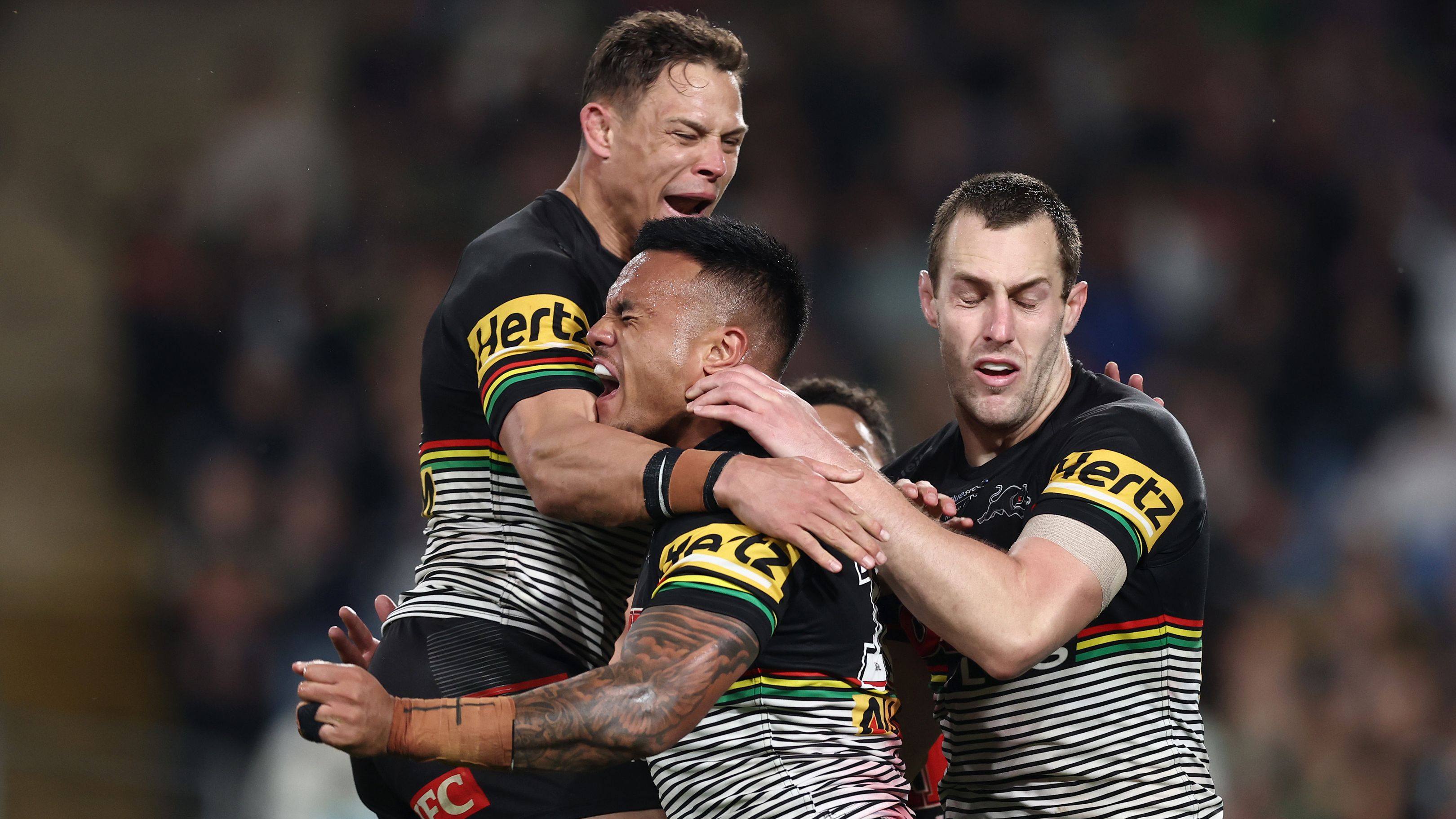 Penrith Panthers celebrate a Spencer Leniu try in their win over South Sydney.