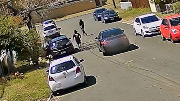 Police have released CCTV footage after bullets were fired at a car with a baby inside last year.