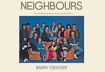 When did Barry Crocker record the theme song from Neighbours?