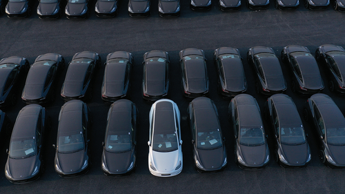 GRUENHEIDE, GERMANY - MARCH 25: In this aerial view newly completed Tesla Model Y electric cars stand at the new Tesla Gigafactory electric car manufacturing plant on March 25, 2022 near Gruenheide, Germany. The new plant, officially called the Gigafactory Berlin-Brandenburg, officially opened on March 22 with an event with German Chancellor Olaf Scholz and Tesla CEO Elon Musk. The new plant is producing the Model Y as well as electric car batteries.  (Photo by Sean Gallup/Getty Images)