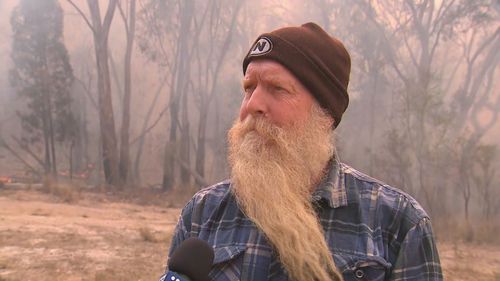 A watch and act warning was issued for residents of Wyberba overnight which asked residents to prepare to leave however the warning has since been downgraded. "We saw a wall of fire coming up over that ridge there," local resident Anthony Rice told 9News. Bushfire Queensland's Southern Downs region.