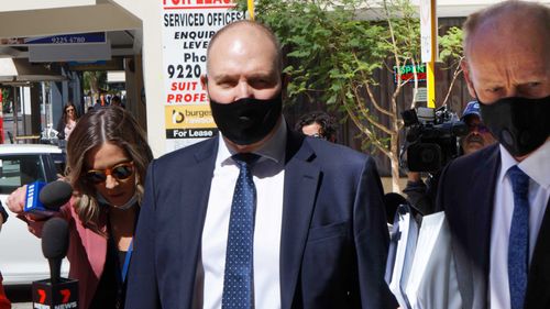 Nev Power arrived at Perth Magistrates Court of Appeals for violating WA's COVID boundary rules in 2021. 