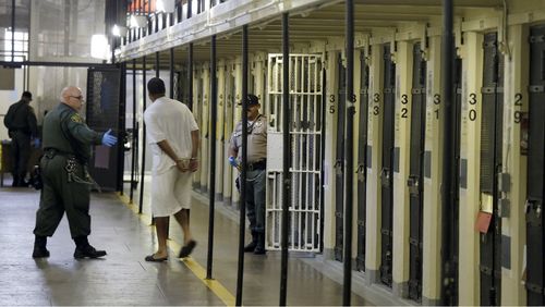 Thousands of inmates in California jails could be freed as the state revisits its three-strike law.