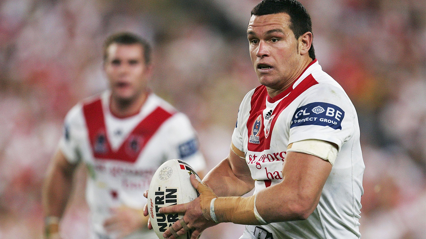 Jason Ryles runs the ball during the 2006 second preliminary final between the Melbourne Storm and the St George Illawarra Dragons.