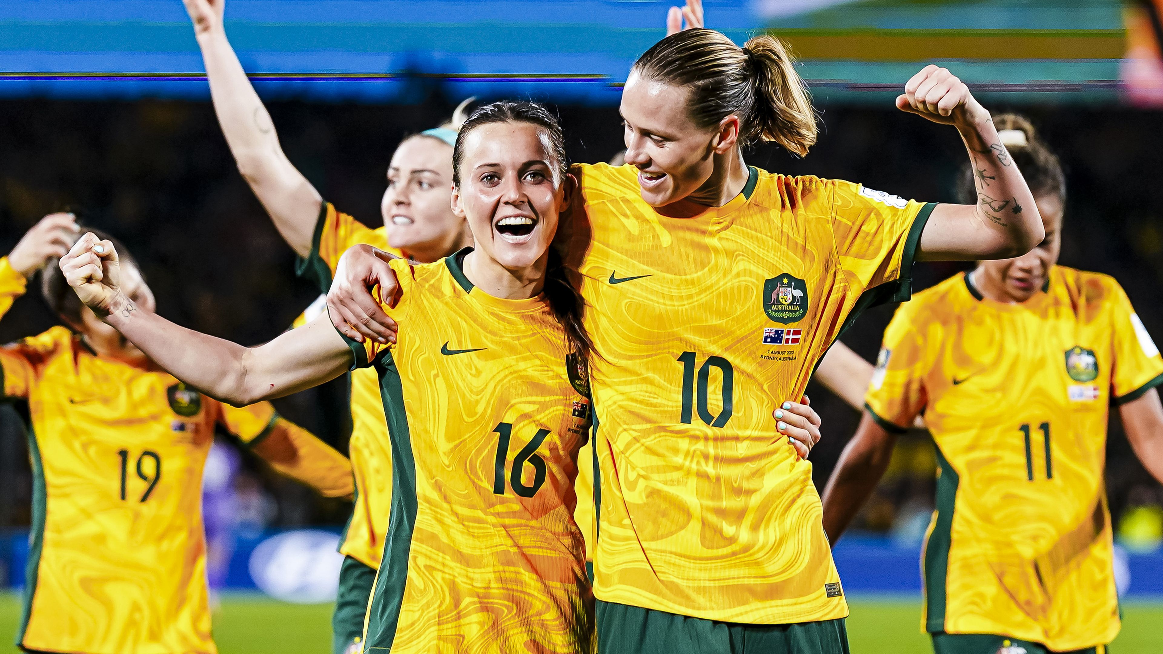 Hayley Raso and Emily Van Egmond celebrate after the Matildas&#x27; convincing 2-0 win over Denmark.