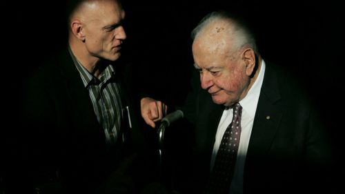 Former Labor MP Peter Garrett with Whitlam in 2006. (AAP)
