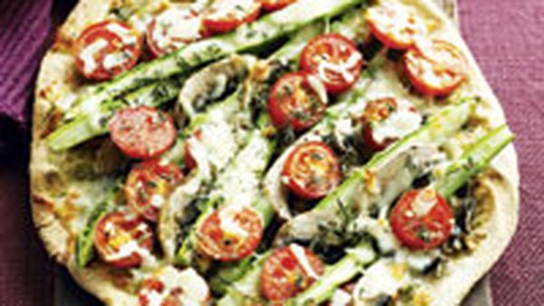 Asparagus, mushroom, tomato and mozzarella pizza