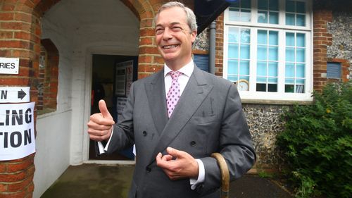 Ukip party leader Nigel Farage, a prominent member of the leave campaign, gestures as he arrives to cast his vote in Biggin Hill, south eastern England. (AAP)