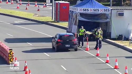 Police are working at the Queensland-New South Wales border to ensure only essential workers enter the sunshine state, in a bid to stop the virus from spreading.