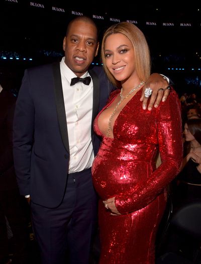 Jay-Z and Beyonce in a glittering red gown by Peter Dundas at the 2017 Grammy Awards