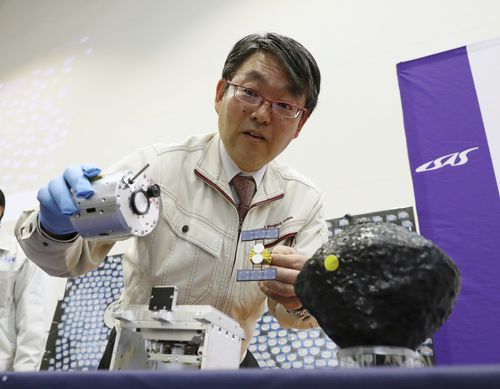 Takashi Kubota explains space probe Hayabusa2 will create an artificial crater in a designated area on the Ryugu asteroid to get samples.