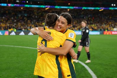 Caitlin Foord and Sam Kerr of Australia celebrate the teams 2-0 victory and advance to the quarter final following the FIFA Women's World Cup Australia & New Zealand 2023 Round of 16 match between Australia and Denmark at Stadium Australia on August 07, 2023 in Sydney / Gadigal, Australia. (Photo by Maddie Meyer - FIFA/FIFA via Getty Images)