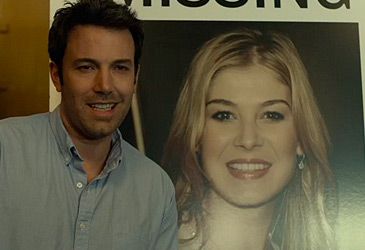 Amy Dunne fakes her own murder on the day of which event in Gone Girl?