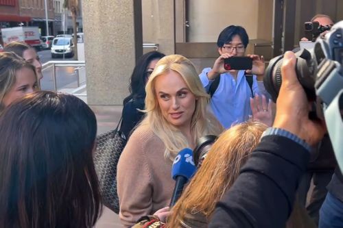 In a screenshot from a video, Rebel Wilson arrives at the Federal Court of Australia in Sydney on Monday, April 20, 2026.