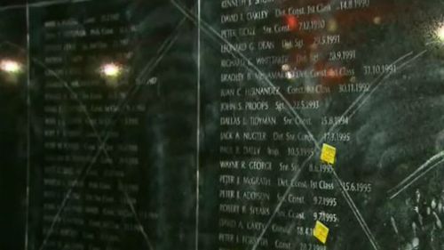 An unknown object was used to scratch marks into the monument. (9NEWS)