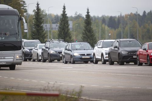 Cars coming from Russia wait in lines at the Vaalimaa border check point between Finland and Russia in Virolahti, Eastern Finland Wednesday, Sept. 28, 2022.  